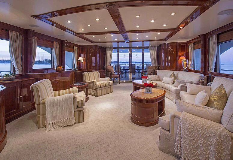 a living room with a large window aboard FELICITA Yacht for Sale