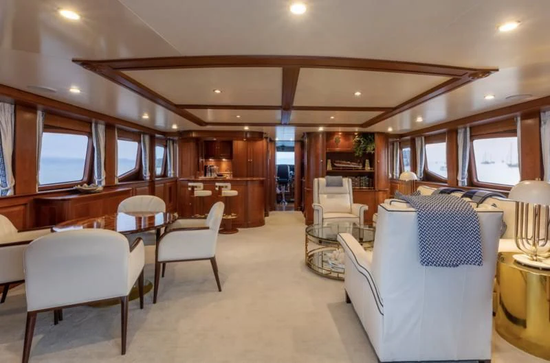 a room with a couch and chairs aboard FELICITA Yacht for Sale