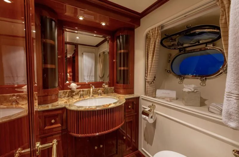 a bathroom with a large mirror aboard FELICITA Yacht for Sale