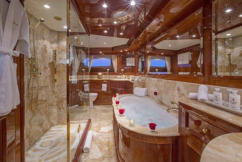 a bathroom with a large tub aboard FELICITA Yacht for Sale