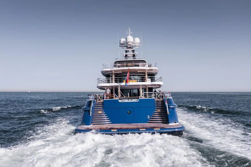 a boat in the ocean with Thomas Point Shoal Light in the background aboard M&EM Yacht for Sale