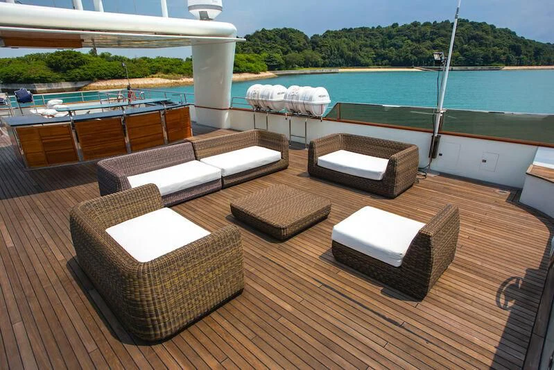a table with chairs on it aboard STAR OF THE SEA Yacht for Sale