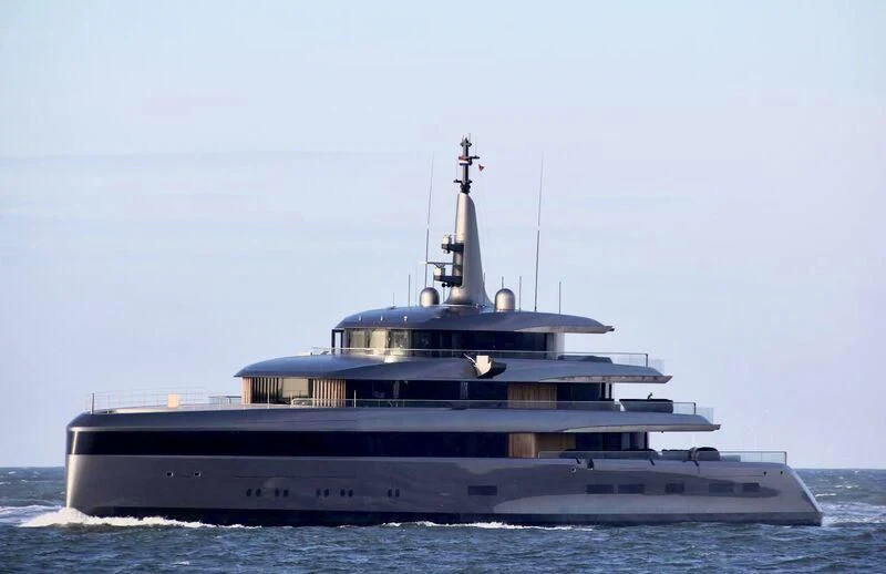 a large ship in the water aboard OBSIDIAN Yacht for Sale