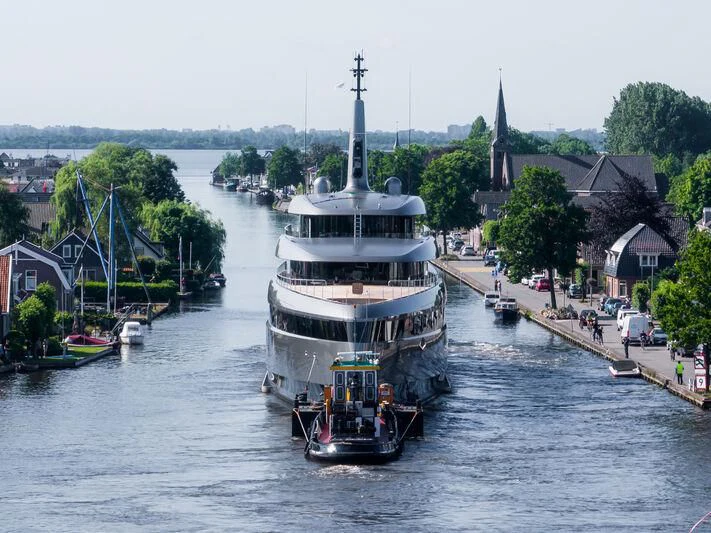 a boat sailing on a river aboard OBSIDIAN Yacht for Sale