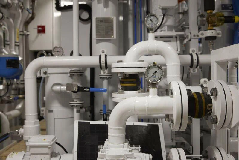 a machine in a factory aboard OBSIDIAN Yacht for Sale