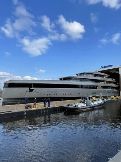 a boat docked at a pier aboard OBSIDIAN Yacht for Sale