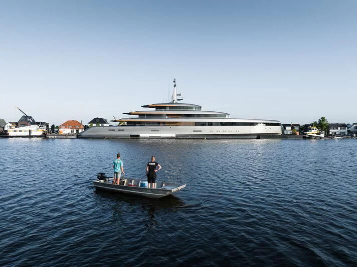 a large ship in the water aboard OBSIDIAN Yacht for Sale