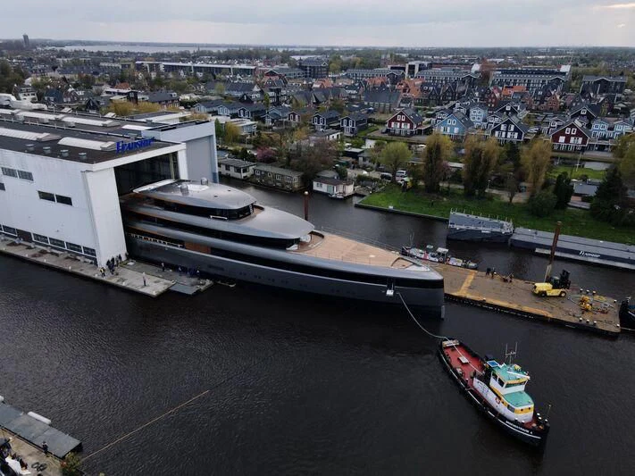 a large boat docked at a port aboard OBSIDIAN Yacht for Sale