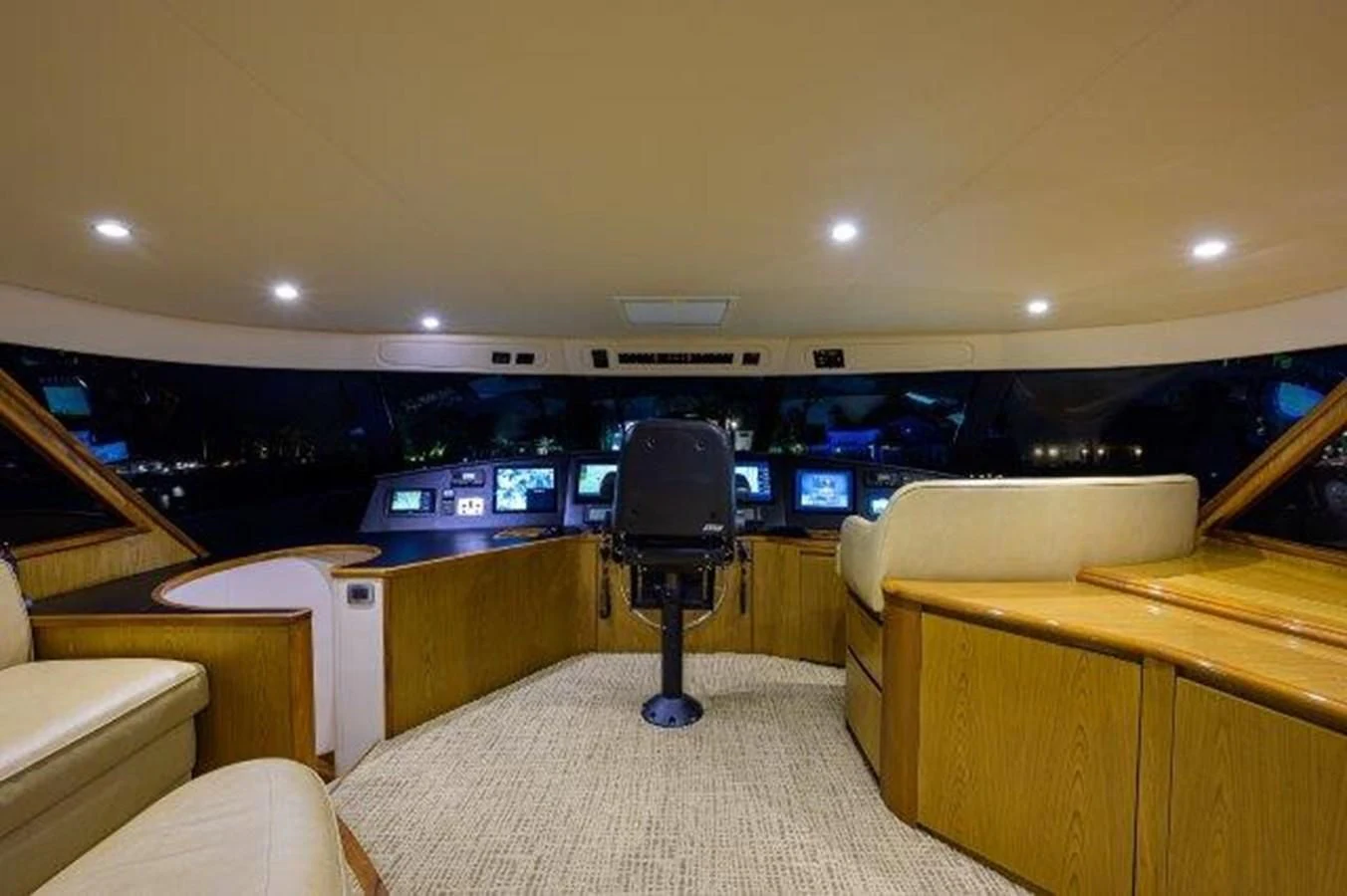 a room with a bed and a chair aboard LITTLE AUDREY Yacht for Sale