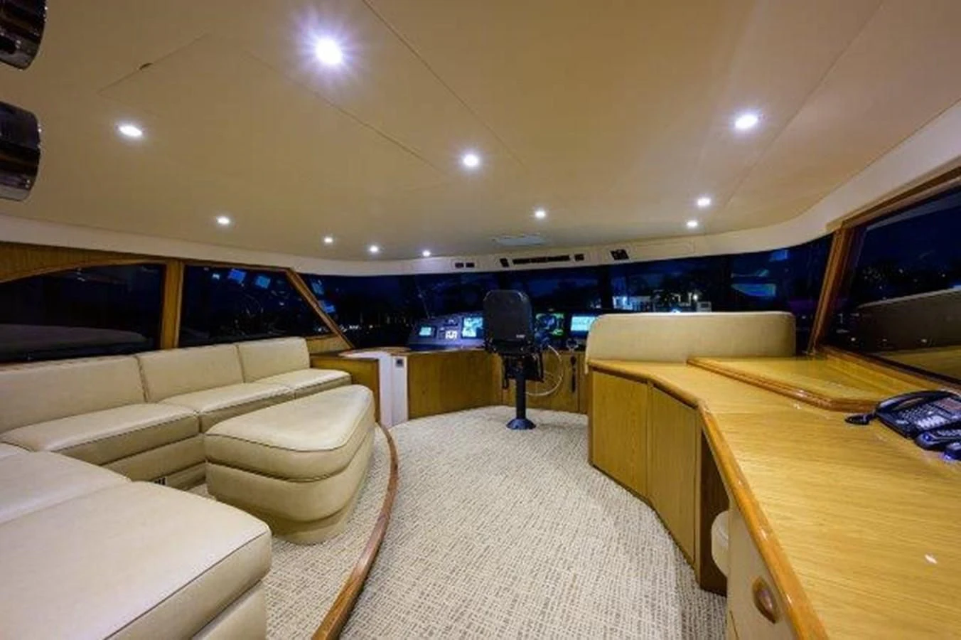 a room with a couch and a tv aboard LITTLE AUDREY Yacht for Sale