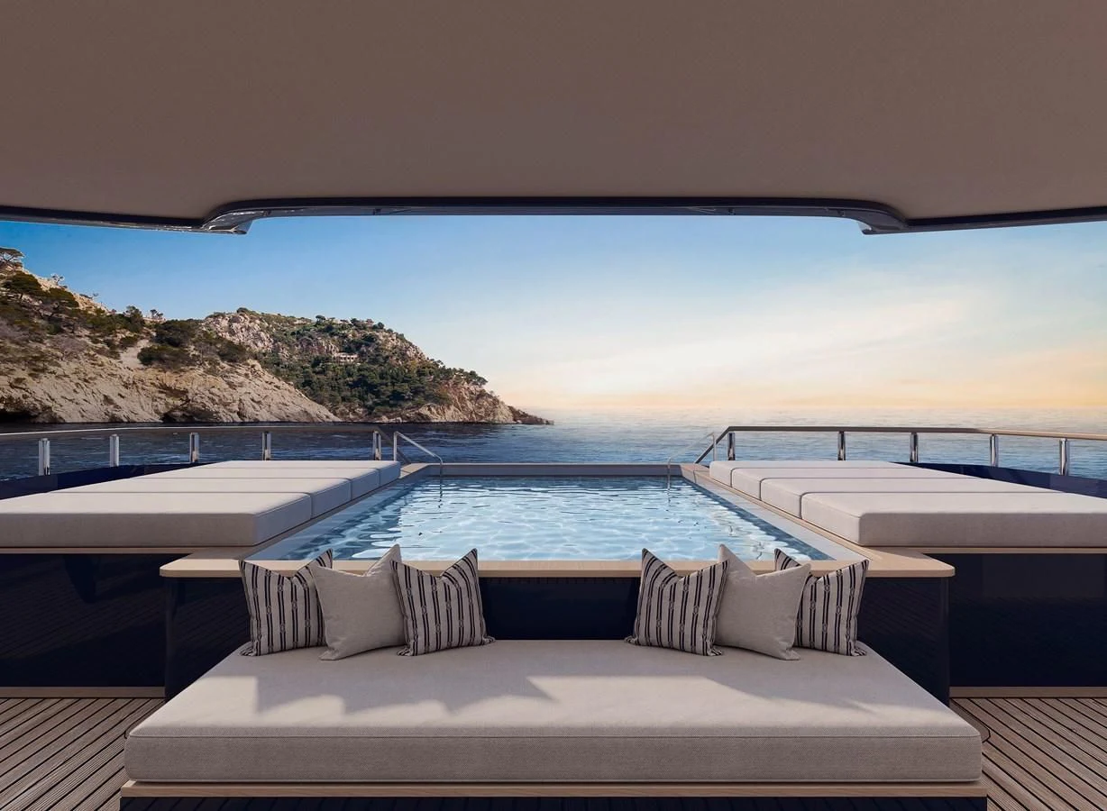 a pool with pillows on a deck aboard LES CINQ Yacht for Sale