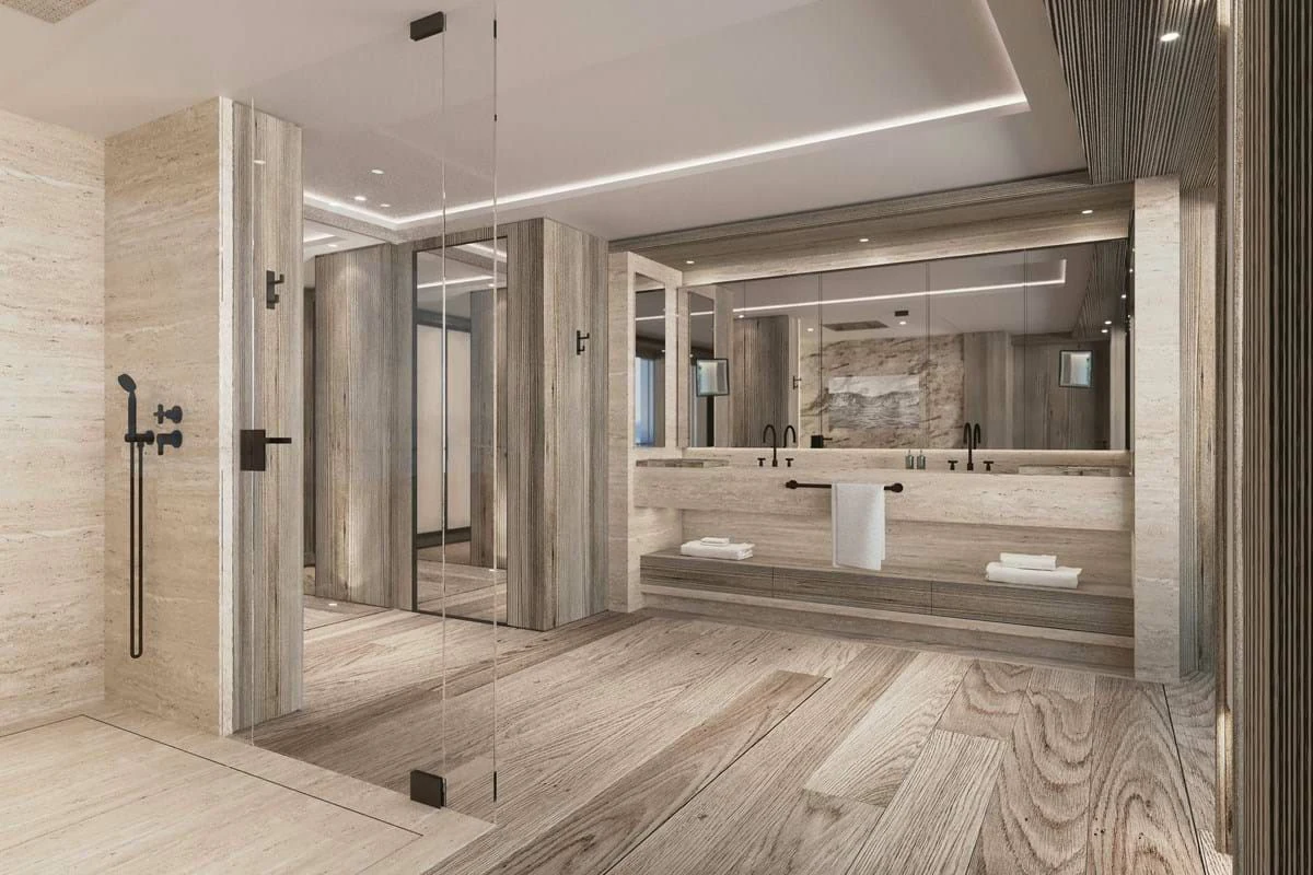 a large bathroom with a large mirror aboard LES CINQ Yacht for Sale
