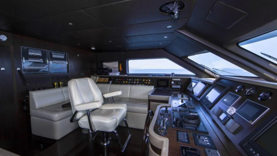 a room with computers and chairs aboard QUID PRO QUO Yacht for Sale