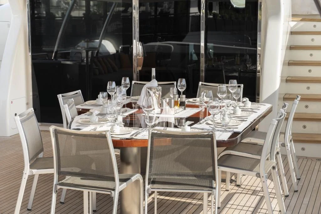 a table set for dinner aboard QUID PRO QUO Yacht for Sale