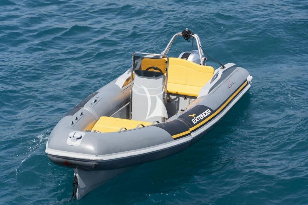 a yellow and black boat aboard QUID PRO QUO Yacht for Sale