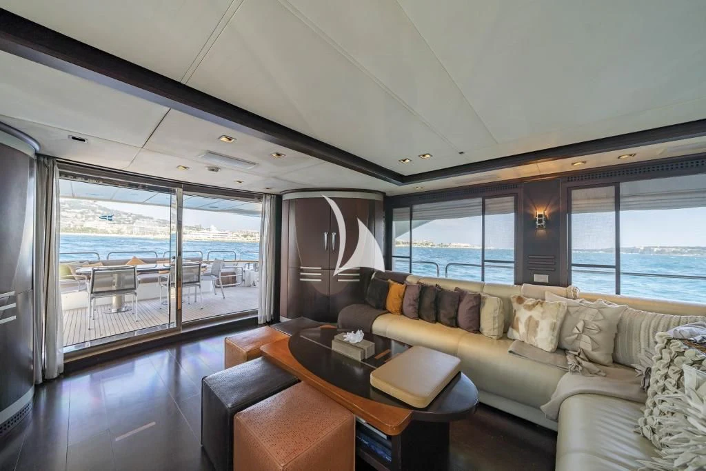 a living room with a large window aboard QUID PRO QUO Yacht for Sale
