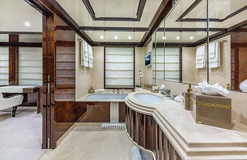 a bathroom with a large tub aboard SPECTRE Yacht for Sale