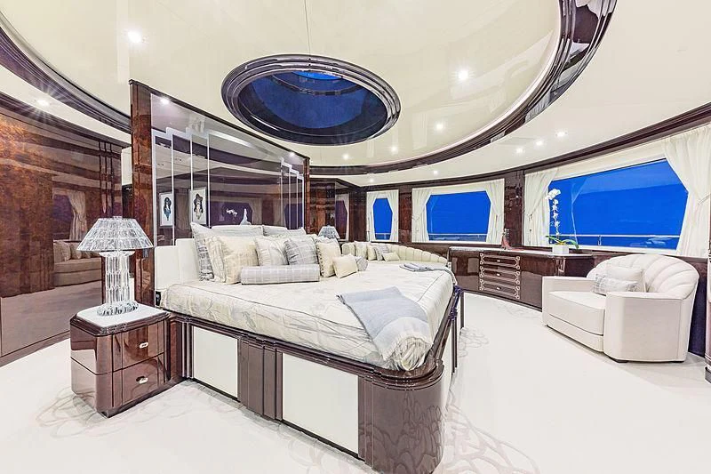 a room with a bed and a tv aboard SPECTRE Yacht for Sale