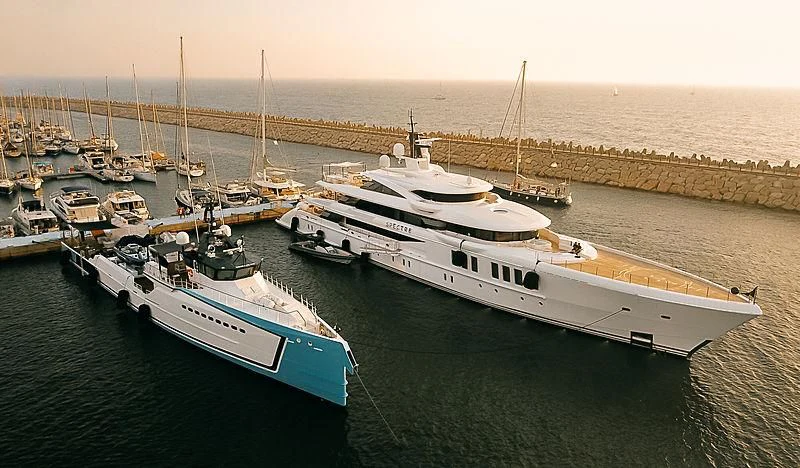 a group of boats in a harbor aboard SPECTRE Yacht for Sale