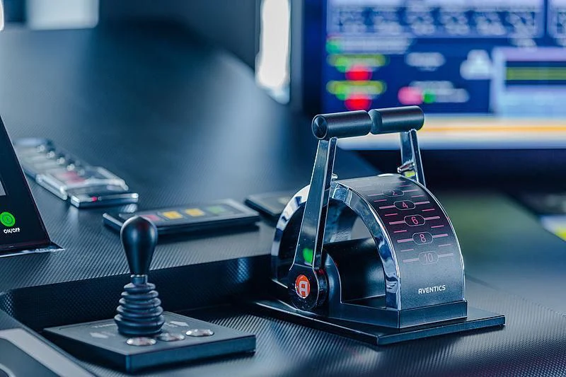 a black and silver car on a desk aboard SPECTRE Yacht for Sale