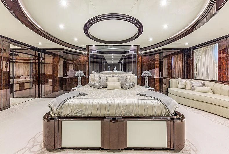 a large bedroom with a large bed aboard SPECTRE Yacht for Sale