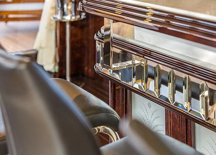 a piano with a piano in the background aboard SPECTRE Yacht for Sale