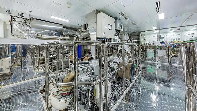 a large room with machines aboard SPECTRE Yacht for Sale