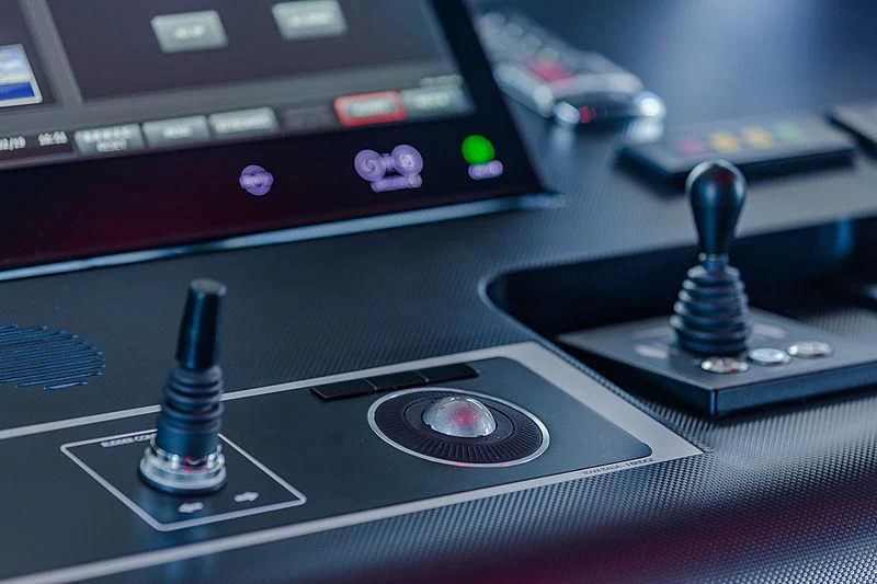 a close-up of a record player aboard SPECTRE Yacht for Sale