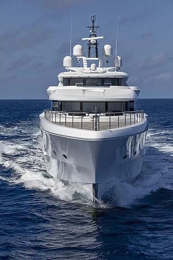 a large white boat aboard SPECTRE Yacht for Sale