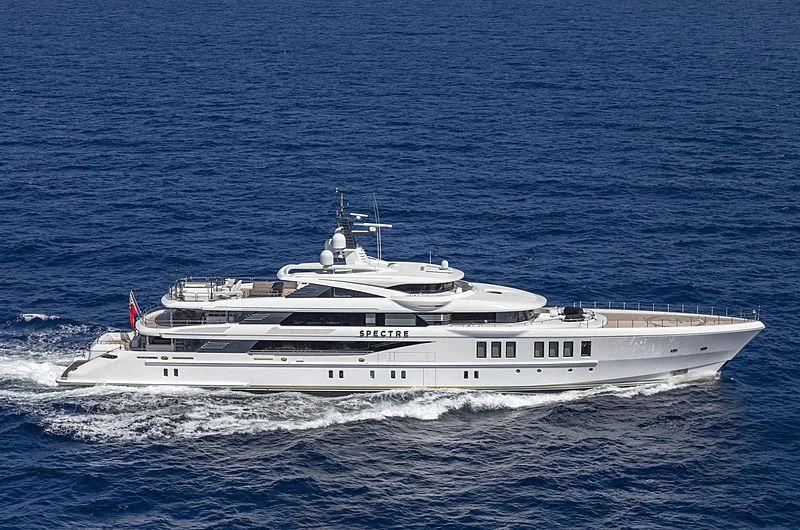 a white yacht in the ocean aboard SPECTRE Yacht for Sale