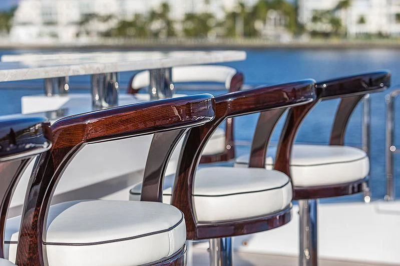 a couple of chairs on a boat aboard SPECTRE Yacht for Sale