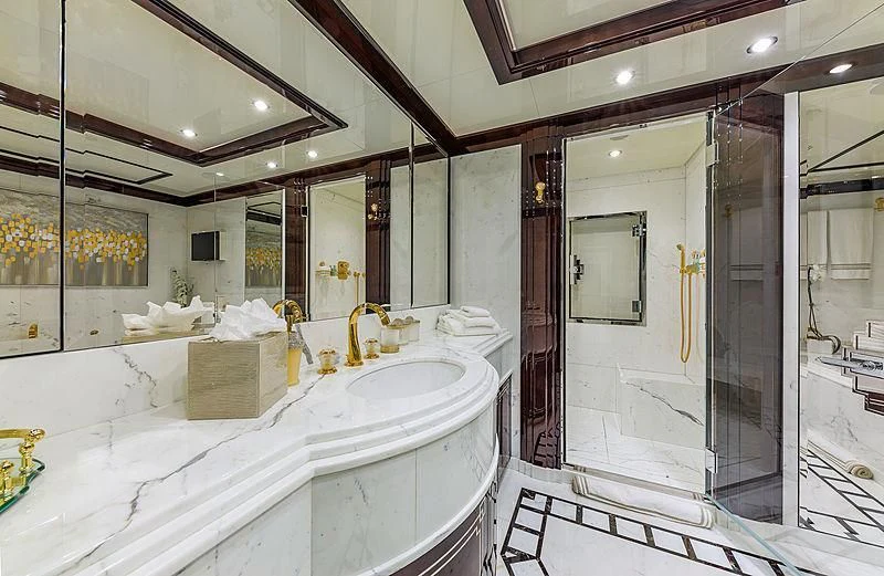 a bathroom with a large mirror aboard SPECTRE Yacht for Sale