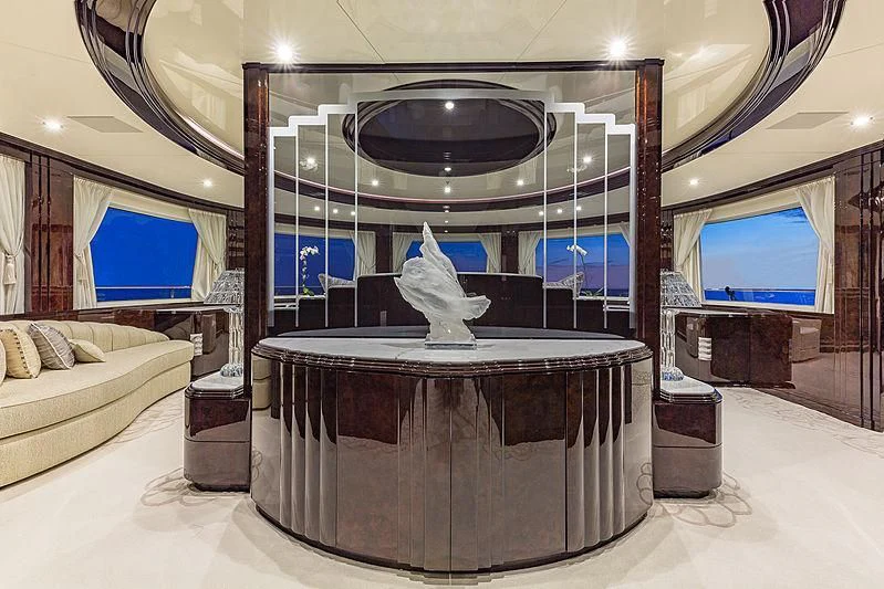 a room with a large mirror aboard SPECTRE Yacht for Sale