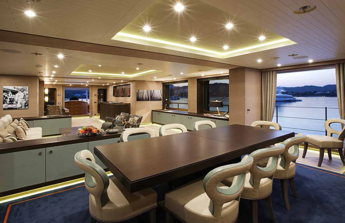 a large kitchen with a large table aboard GENE MACHINE Yacht for Sale