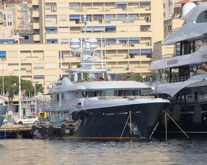 a boat docked at a pier aboard GENE MACHINE Yacht for Sale