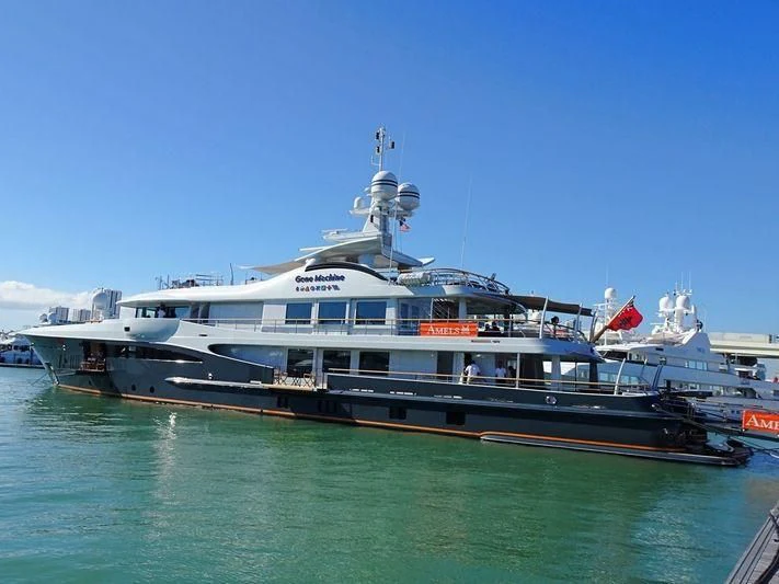 a large ship in the water aboard GENE MACHINE Yacht for Sale