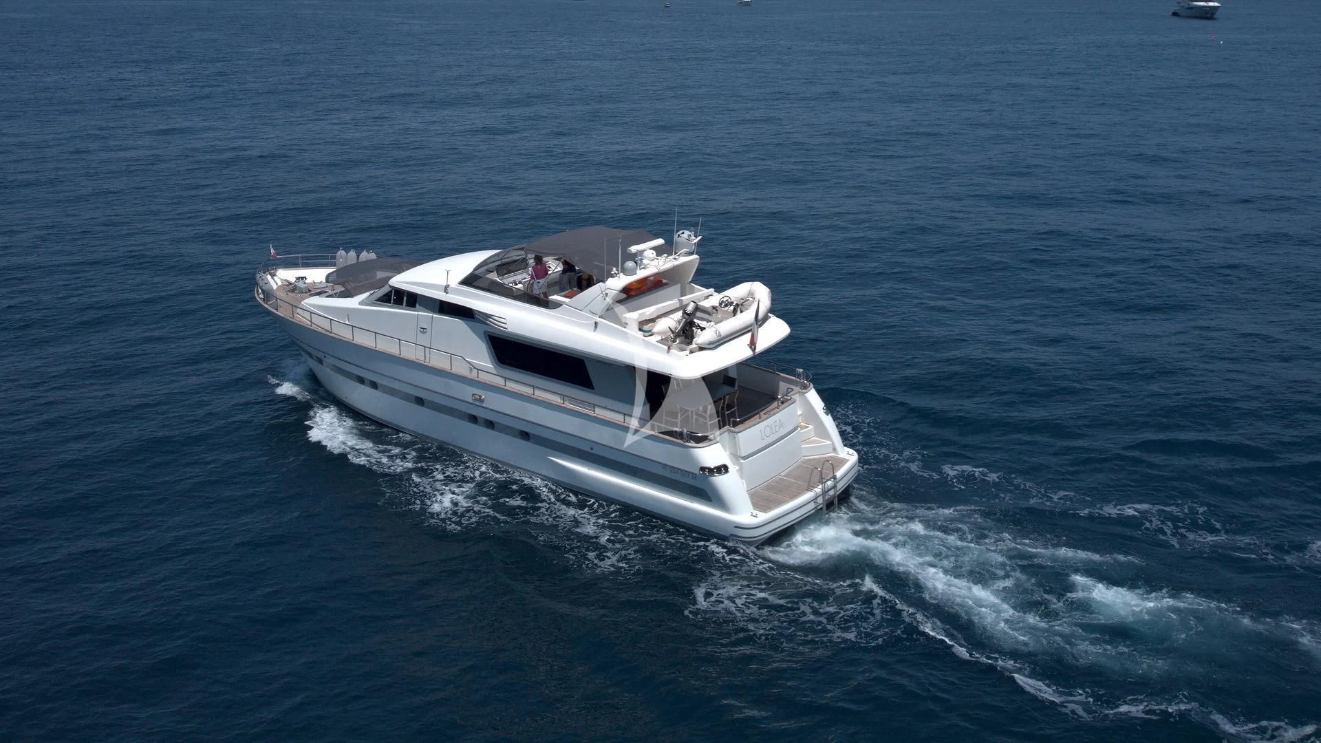 a boat on the water aboard LOLEA Yacht for Charter