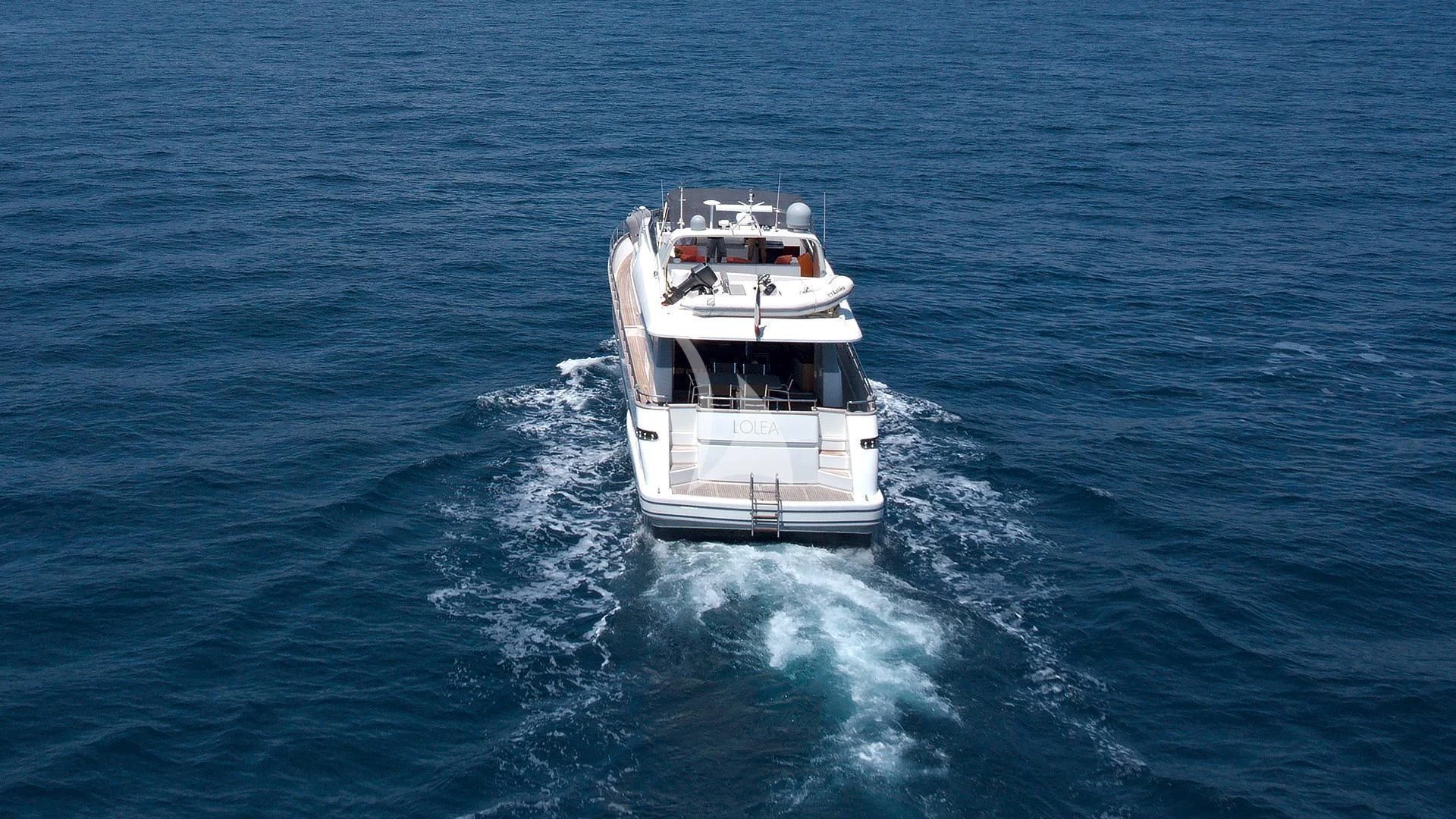 a boat on the water aboard LOLEA Yacht for Charter