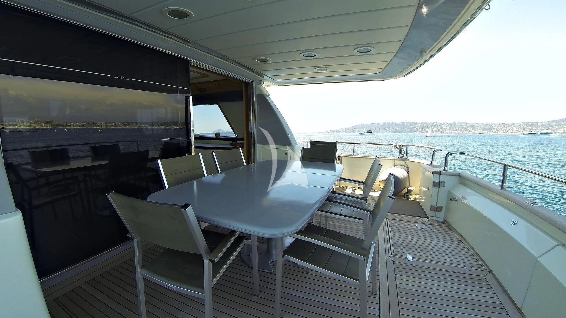 a boat on a deck aboard LOLEA Yacht for Charter
