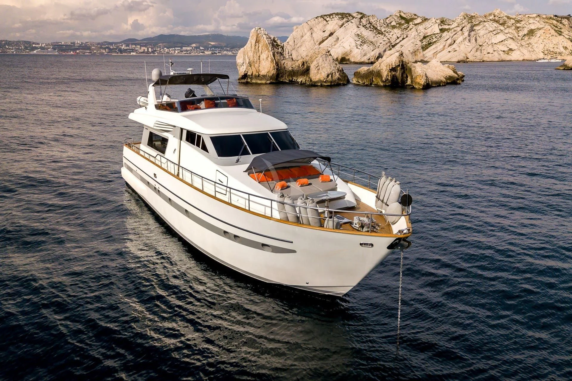 a white yacht in the water aboard LOLEA Yacht for Charter