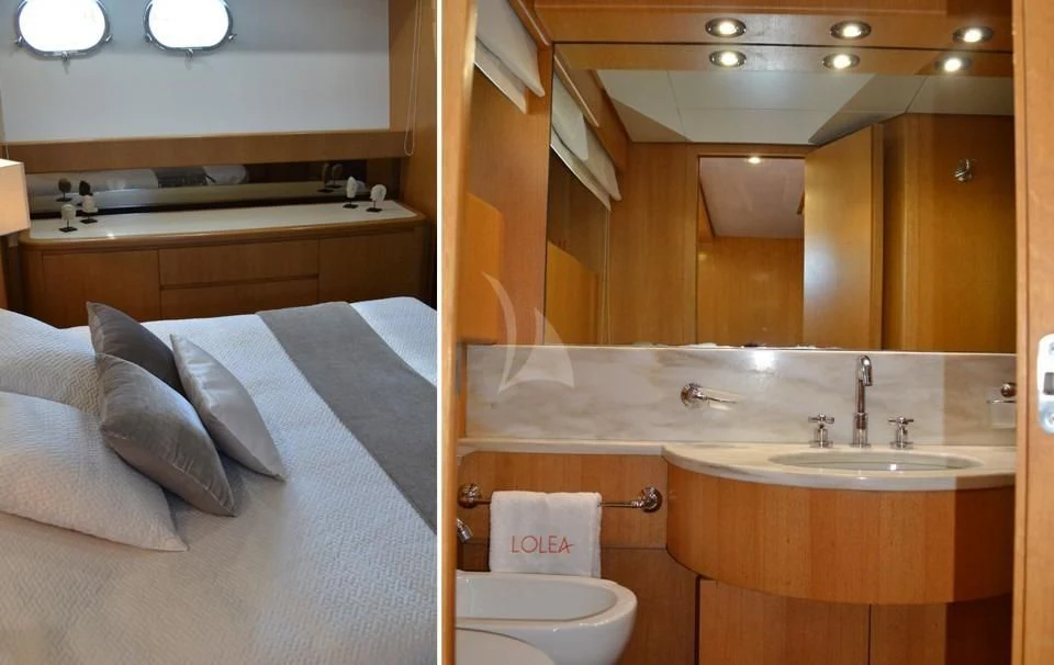 a bathroom with a sink and a toilet aboard LOLEA Yacht for Charter