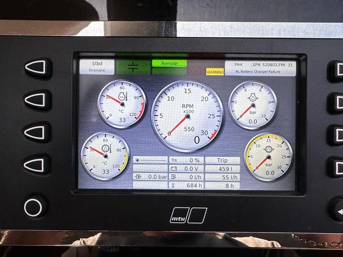 a digital clock on a machine aboard INFINITE VOYAGE III Yacht for Sale