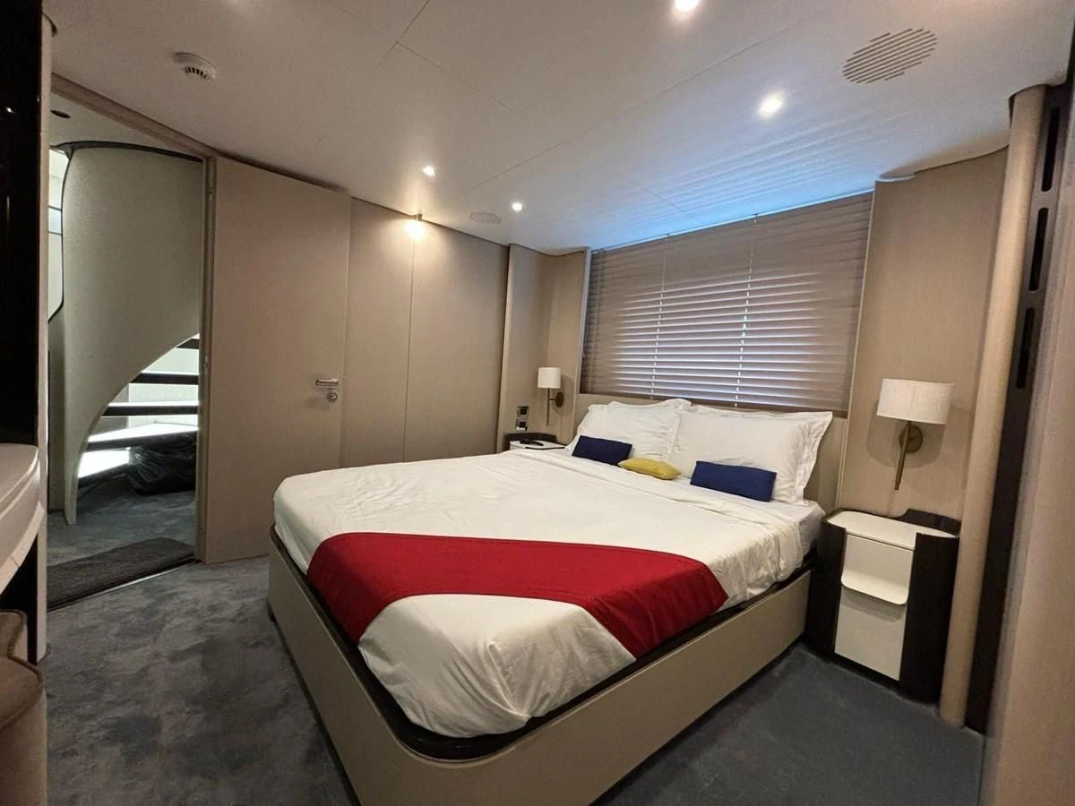 a bed in a room aboard INFINITE VOYAGE III Yacht for Sale