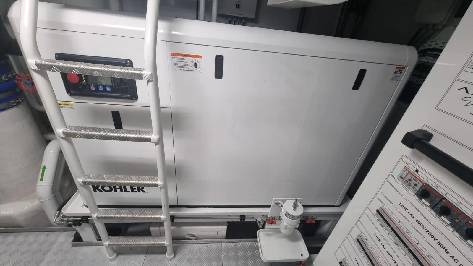 a white machine with a white panel aboard INFINITE VOYAGE III Yacht for Sale