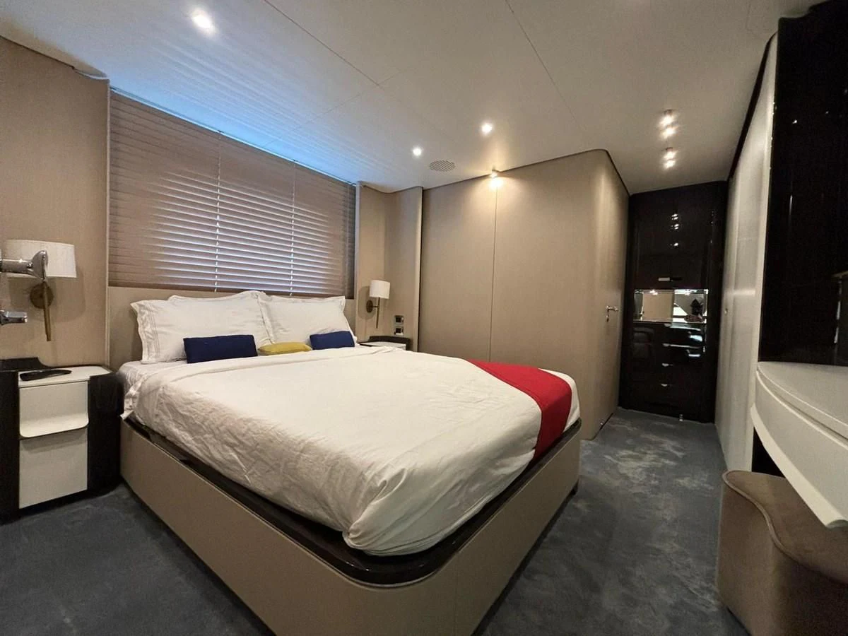 a bed in a room aboard INFINITE VOYAGE III Yacht for Sale