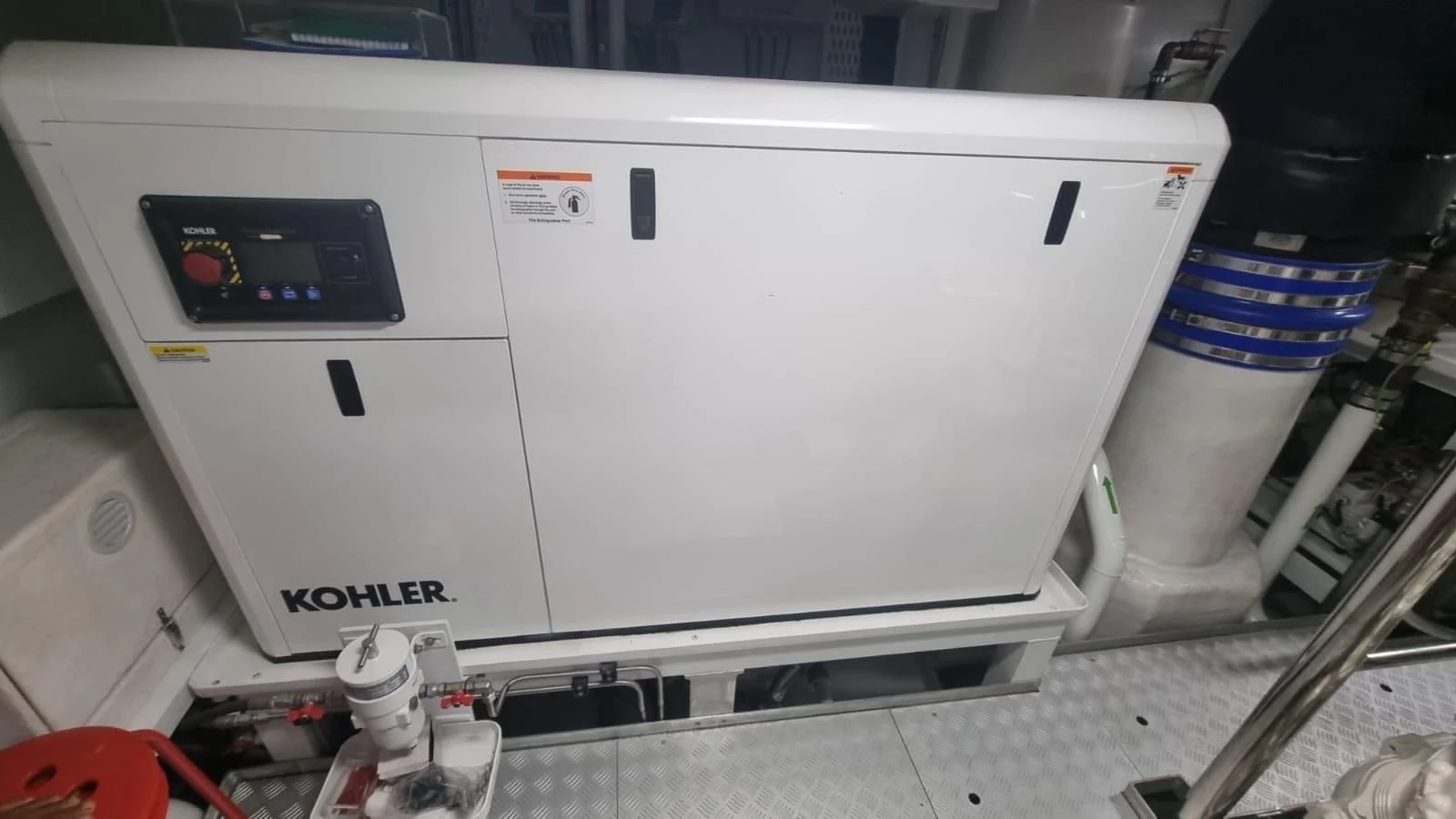 a white machine with a black screen aboard INFINITE VOYAGE III Yacht for Sale