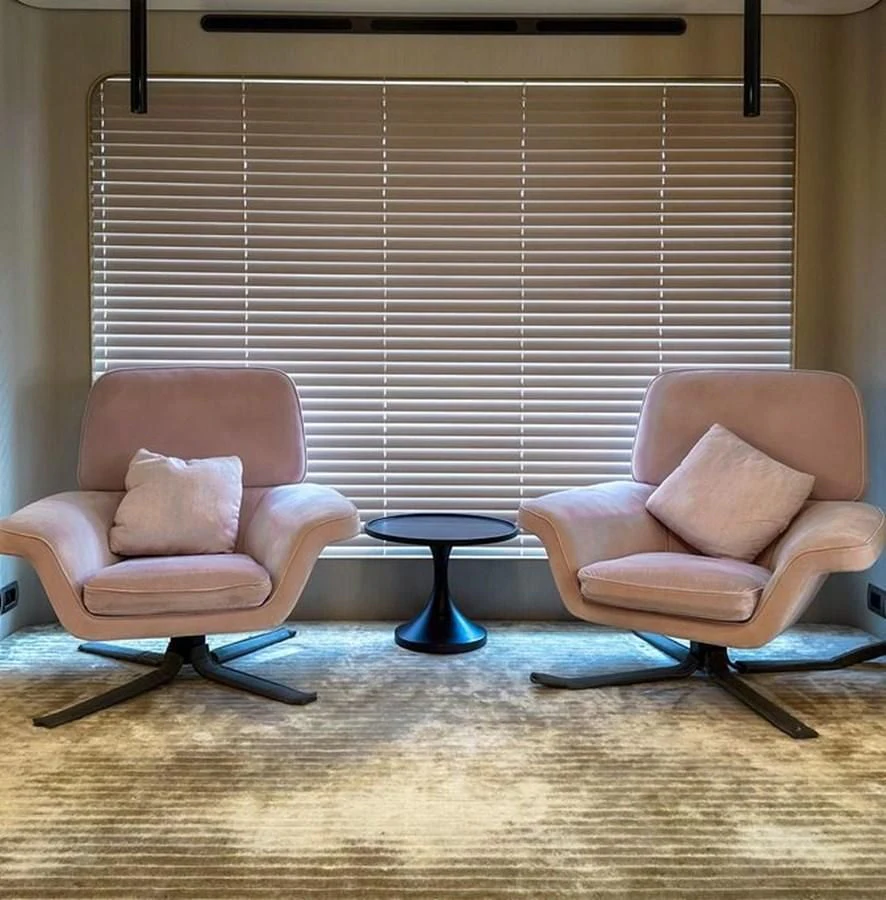 two chairs in front of a window aboard INFINITE VOYAGE III Yacht for Sale
