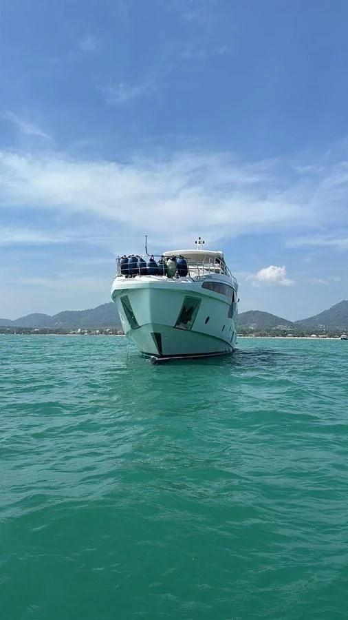 a boat in the water aboard INFINITE VOYAGE III Yacht for Sale