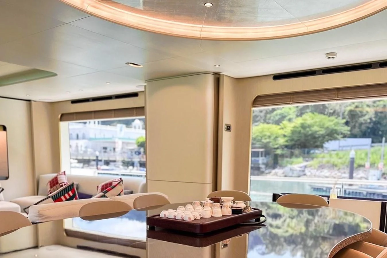 a room with a table and chairs aboard INFINITE VOYAGE III Yacht for Sale