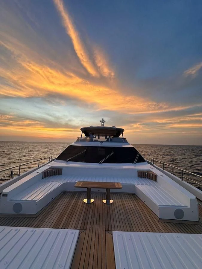 a boat on a deck aboard INFINITE VOYAGE III Yacht for Sale